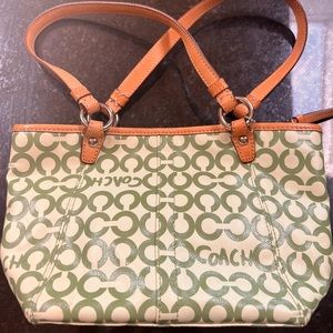 Small coach bag.